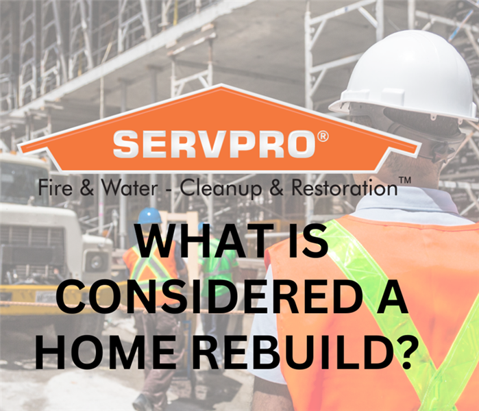Construction in background with green text and orange SERVPRO logo